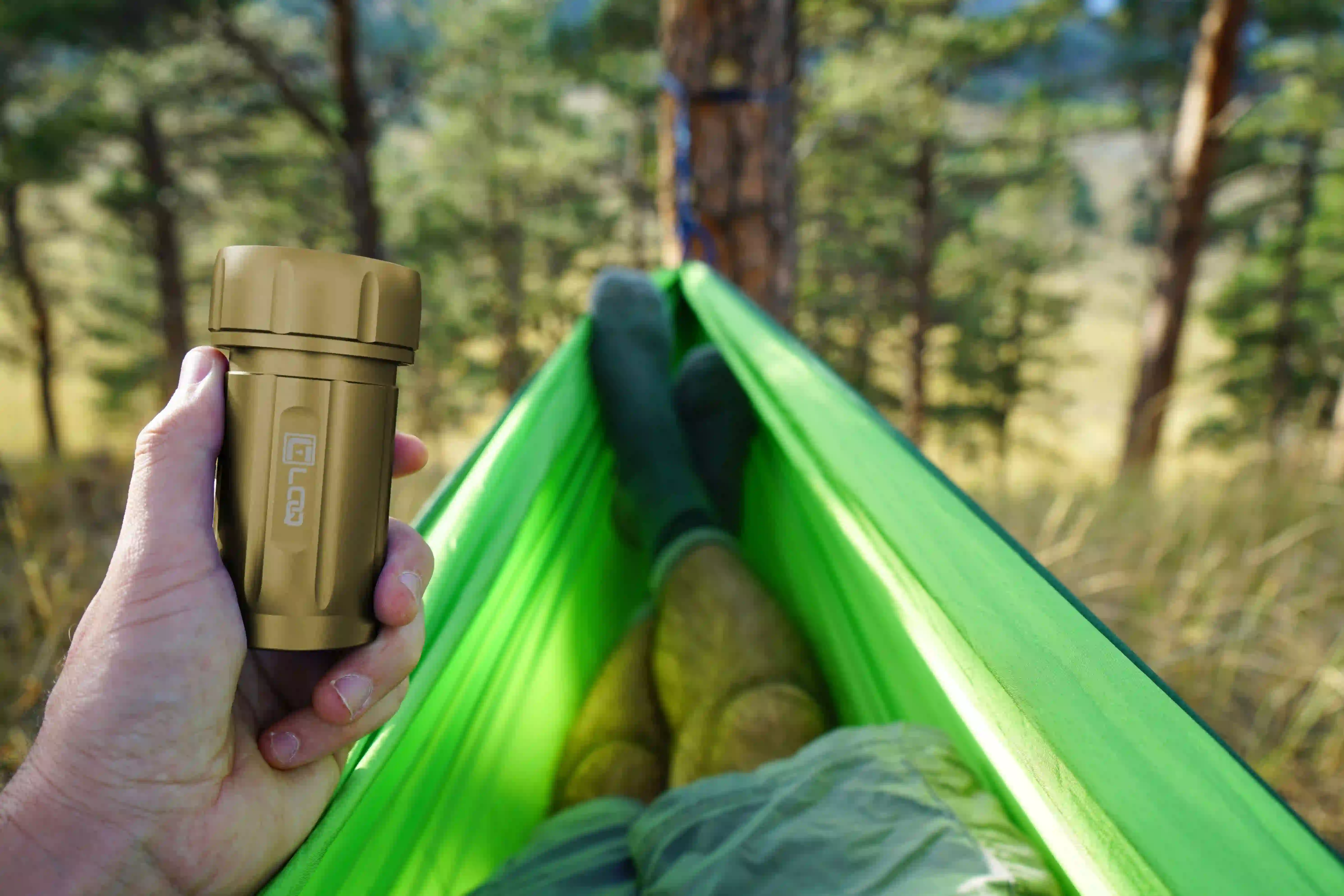 outdoor-weatherproof-camping-storage-canniloq-tan a tan weatherproof canniloq storage container used while camping